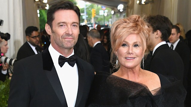 Hugh Jackman in a suit and Deborra-Lee Furness in a tulle dress