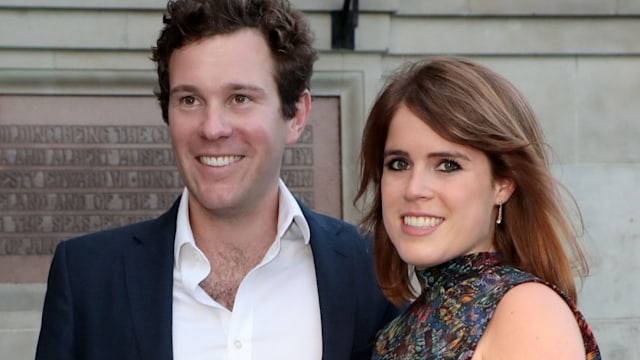 Jack Brooksbank in a suit and Princess Eugenie in a mini dress