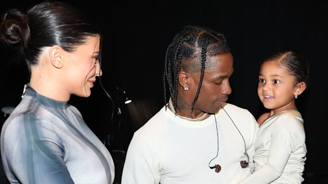 Kylie Jenner, Stormi Webster, and Travis Scott backstage during the 2022 Billboard Music Awards held at the MGM Grand Garden Arena on May 15, 2022. -- (Photo by Christopher Polk/NBC/NBCU Photo Bank via Getty Images)