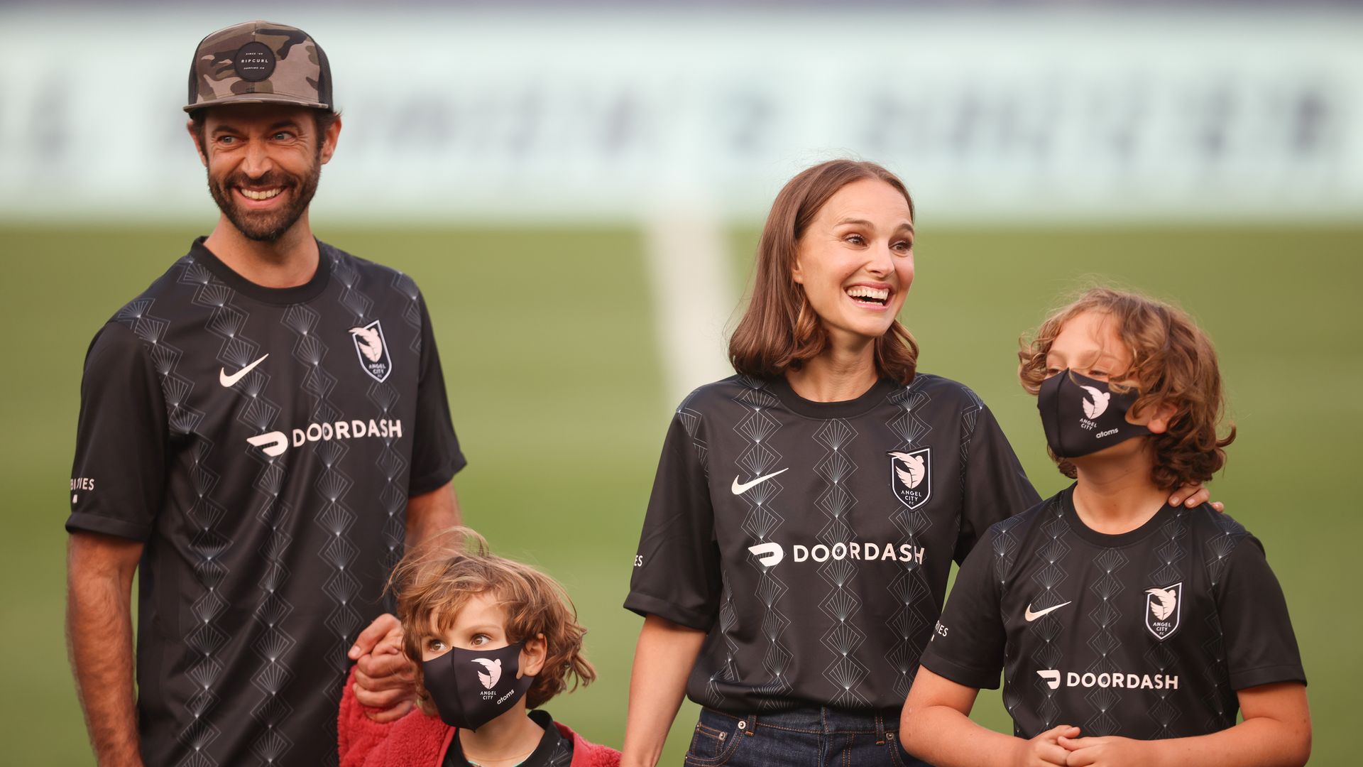 Angel City FC Founder Natalie Portman and her family performs the coin toss before a game between San Diego Wave FC and Angel City FC at Titan Stadium on March 19, 2022 in Fullerton, California
