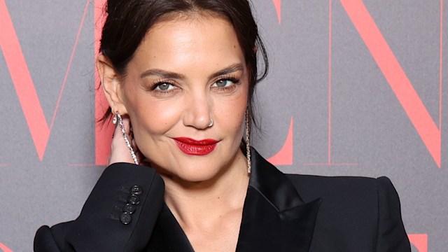 Katie Holmes, 44, sets pulses racing in a plunging black suit at Cannes