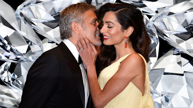 George and Amal on diamond backdrop