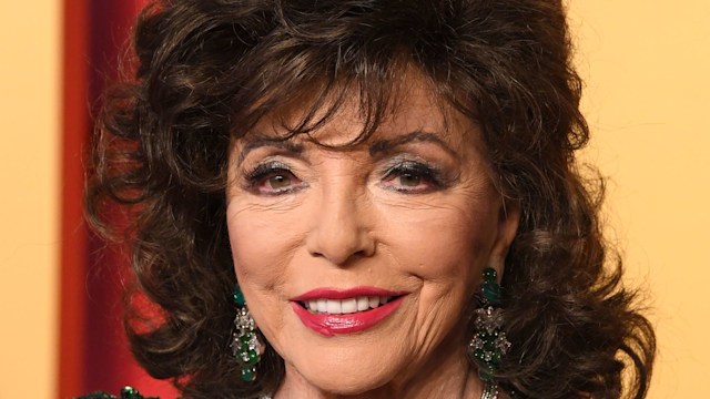 joan collins in green glitter dress at vanity fair oscars