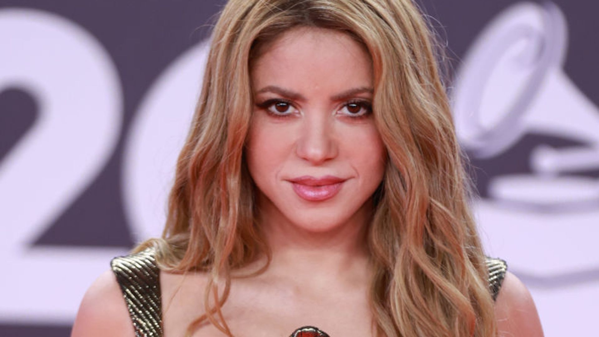 Shakira's adorable young sons look as tall as she is in new celebratory photo