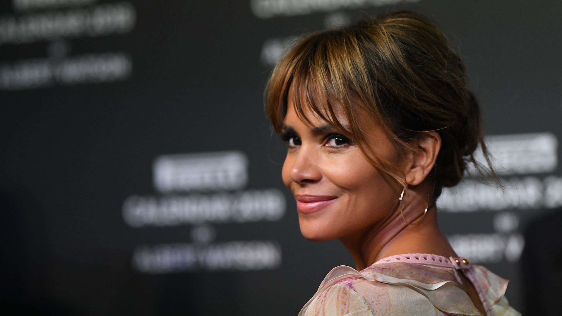 Halle Berry walks the red carpet ahead of the 2019 Pirelli Calendar launch gala at HangarBicocca on December 5, 2018 in Milan, Italy