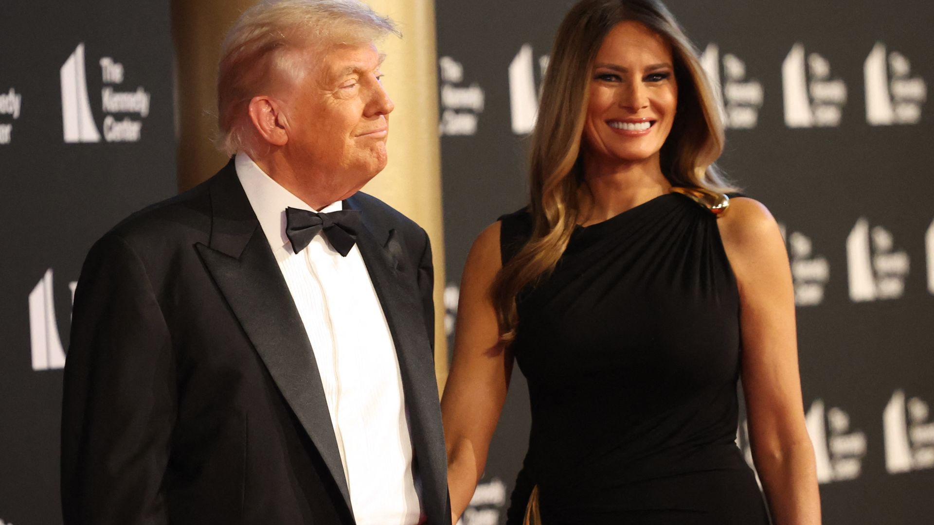 Melania Trump is glowing as she makes rare red carpet appearance with husband Donald
