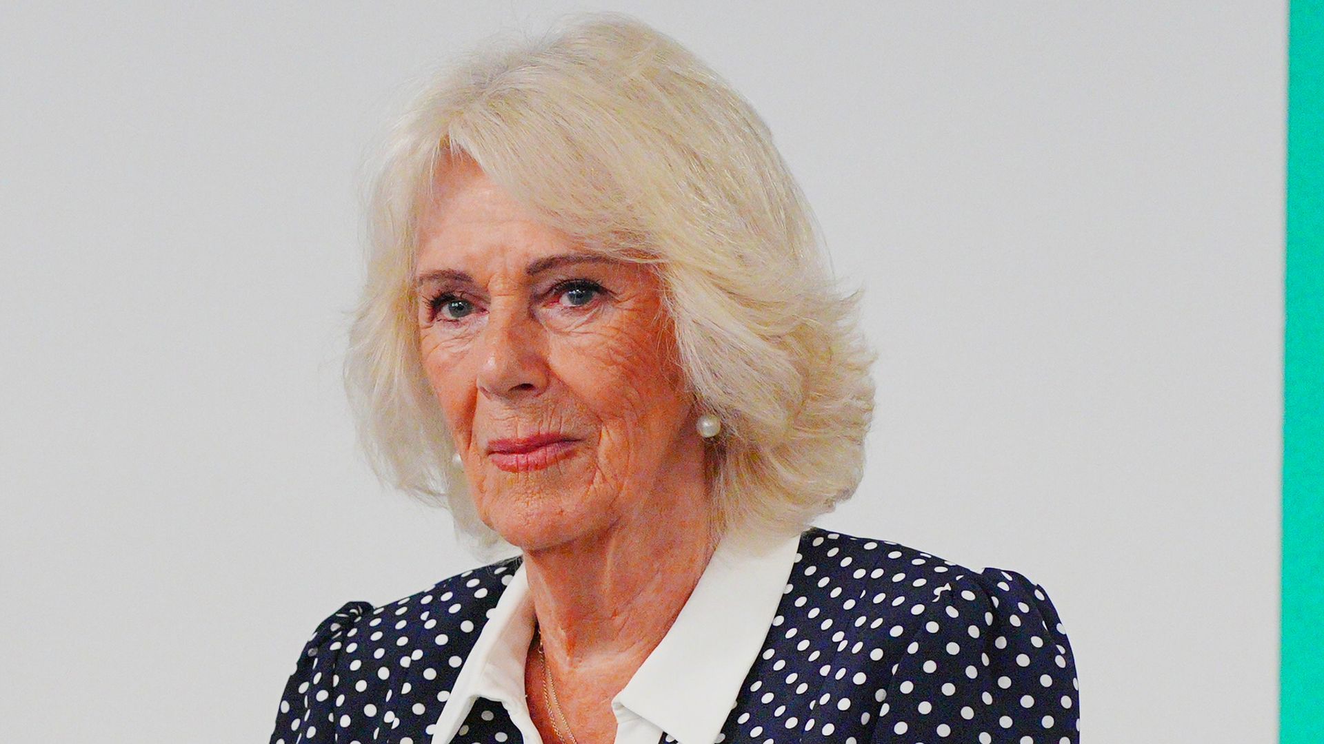 Queen Camilla in a polka dot dress