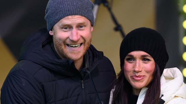 Harry and Meghan smiling 