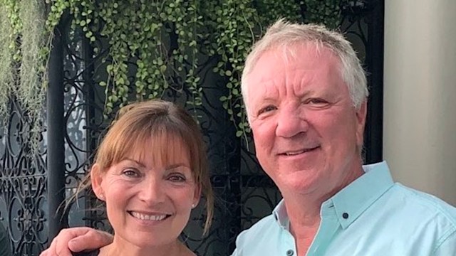 couple posing for photo in outdoor bar 