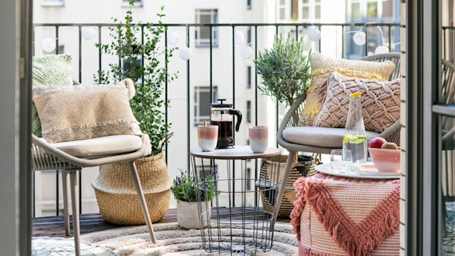 A stylish balcony with seating area