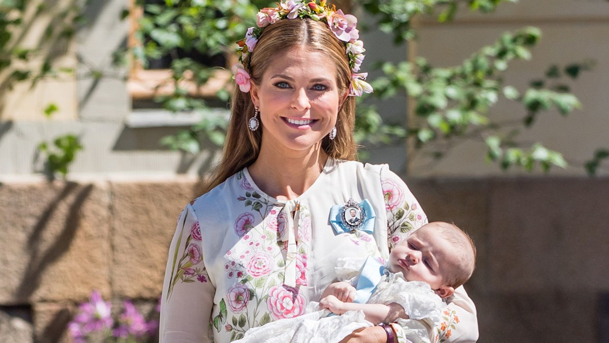 Sweden's Princess Madeleine, left holding Prince Nicolas stands next to her  husband Christopher O'Neill holding their daughter Princess Leonore, with  Queen Silvia and King Carl XVI Gustaf at right, during the christening