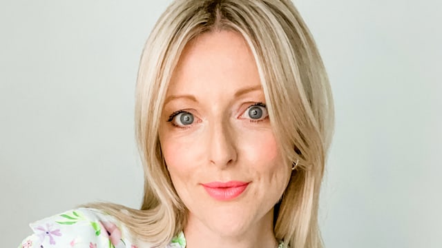 blonde lady in floral top