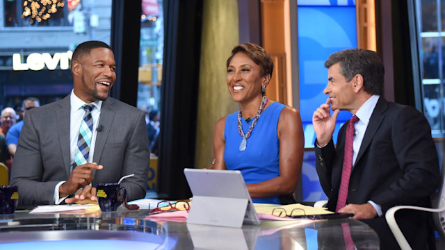 Robin Roberts, MIchael Strahan, George Stephanopoulos on the GMA set