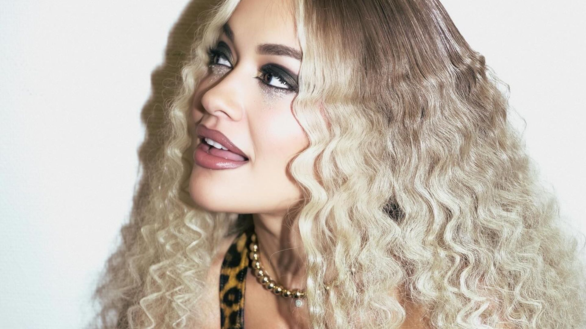 Rita Ora’s latex leopard print bodysuit and sheer tights is a major It-girl mood