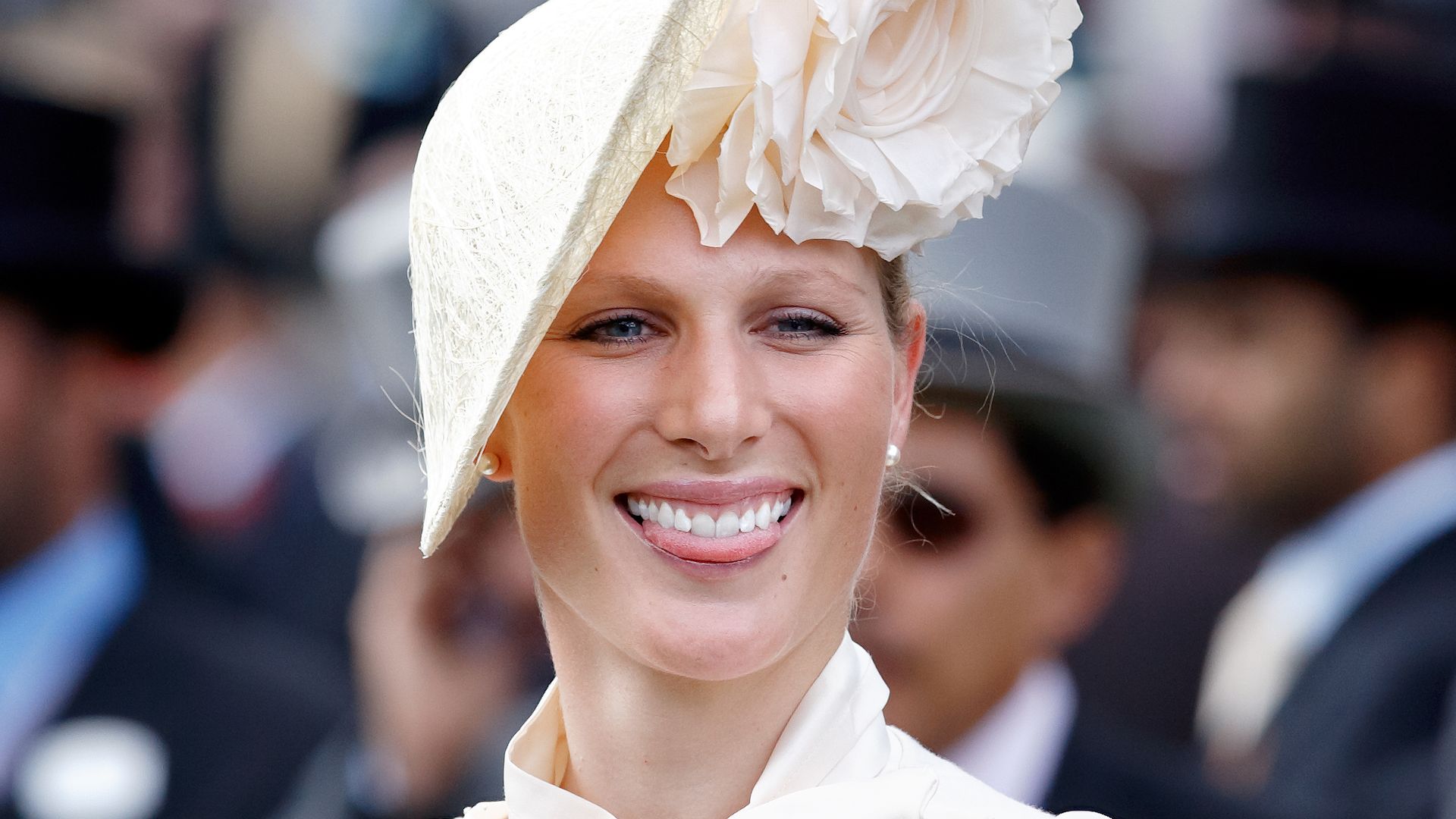 Zara Tindall wears a cream hat at Royal Ascot
