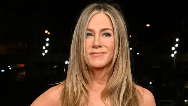 Jennifer Aniston  attends the "Murder Mystery 2" photocall at Pont Debilly  on March 16, 2023 in Paris, France.