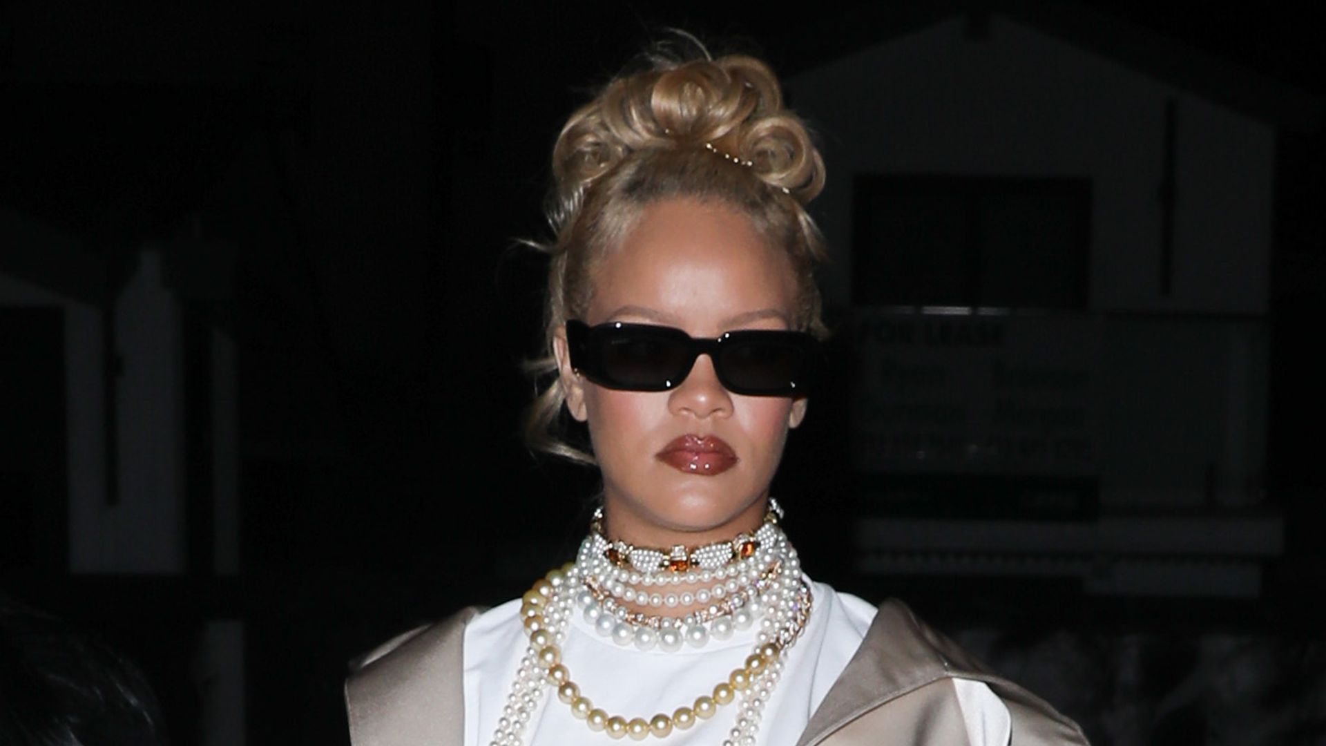 Rihanna looks unrecognizable as she drips in pearls and debuts punky blonde hair