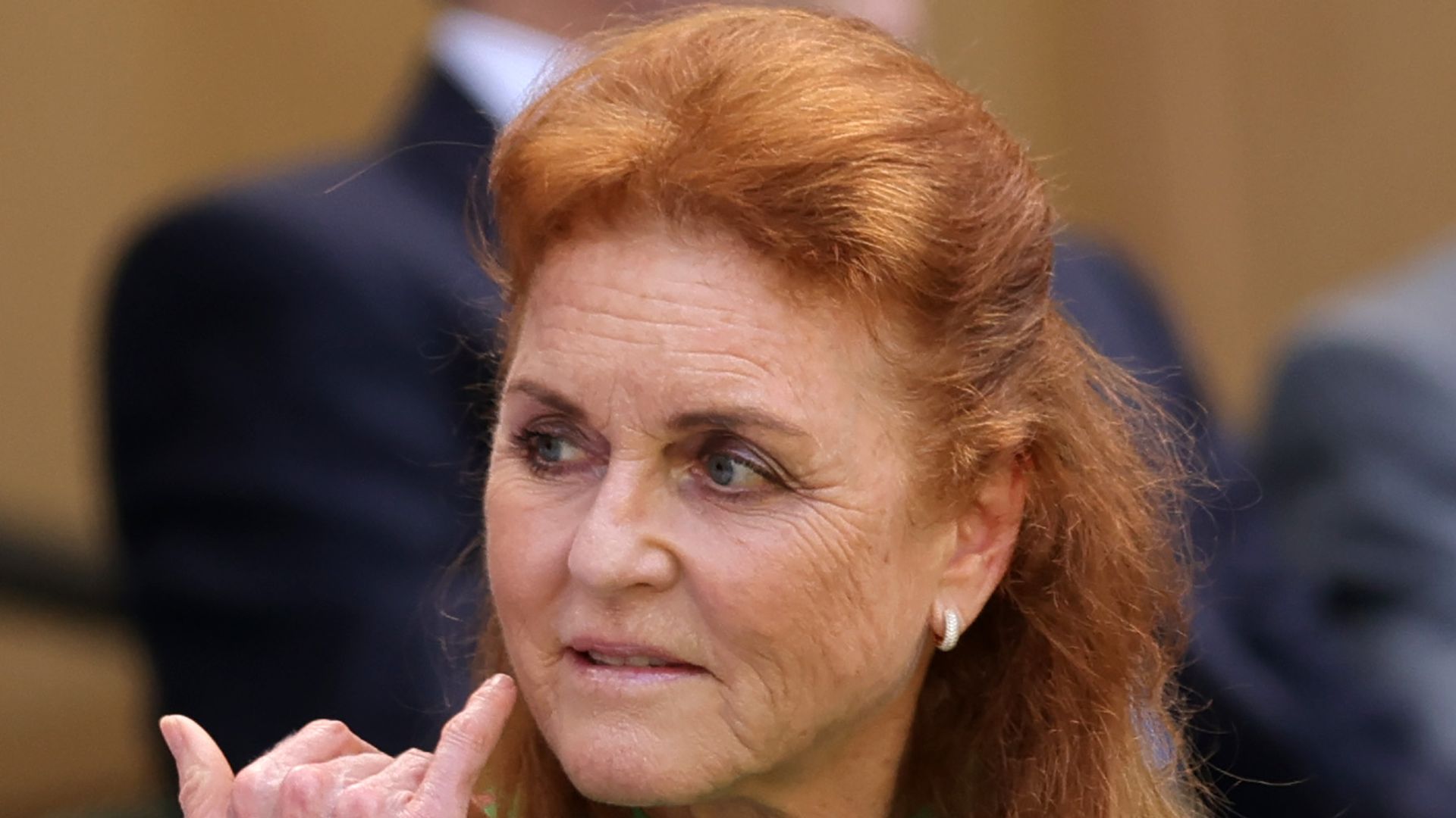 Sarah Ferguson in wimbledon box in green dress