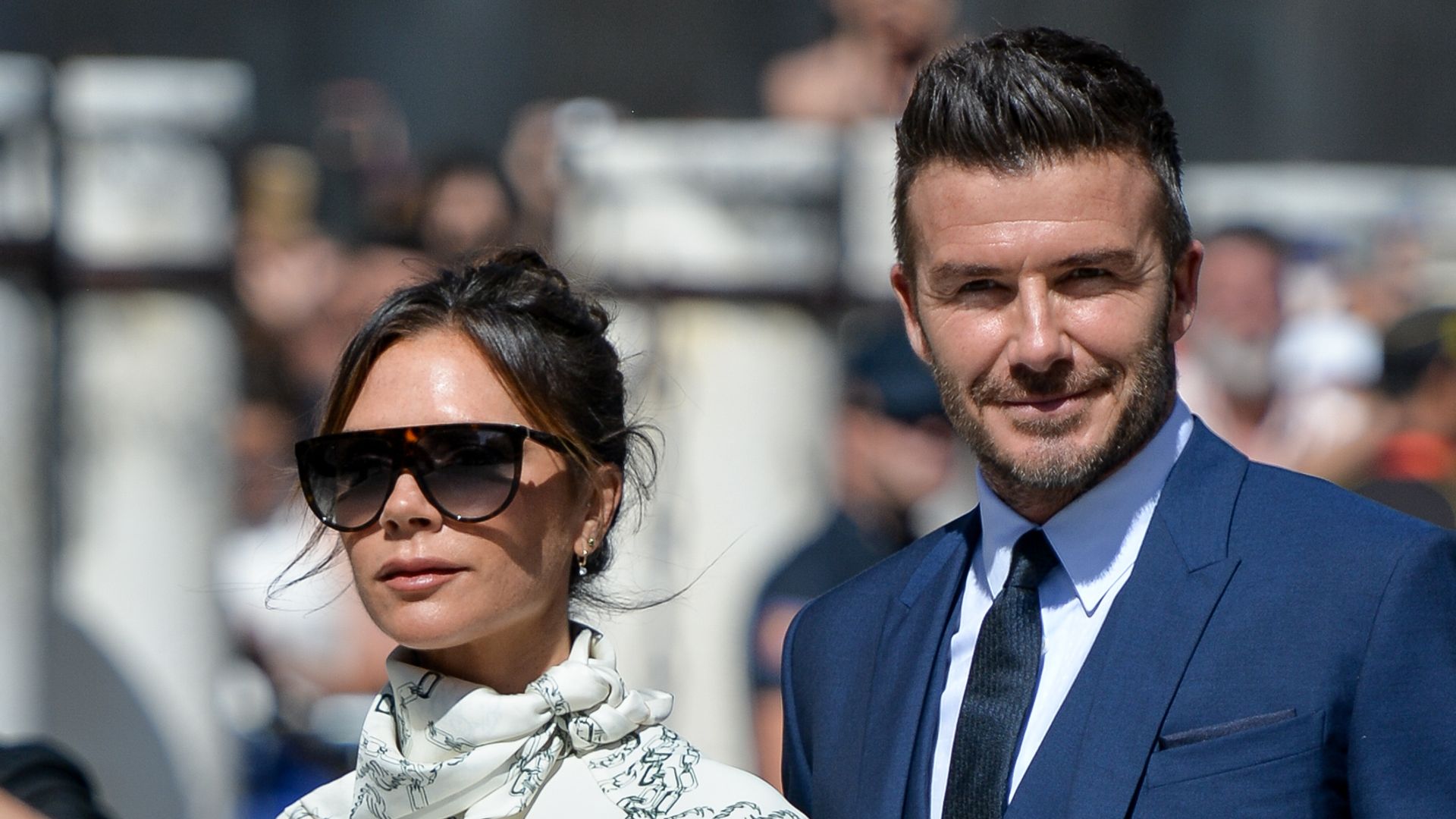 Victoria Beckham stood with David Beckham