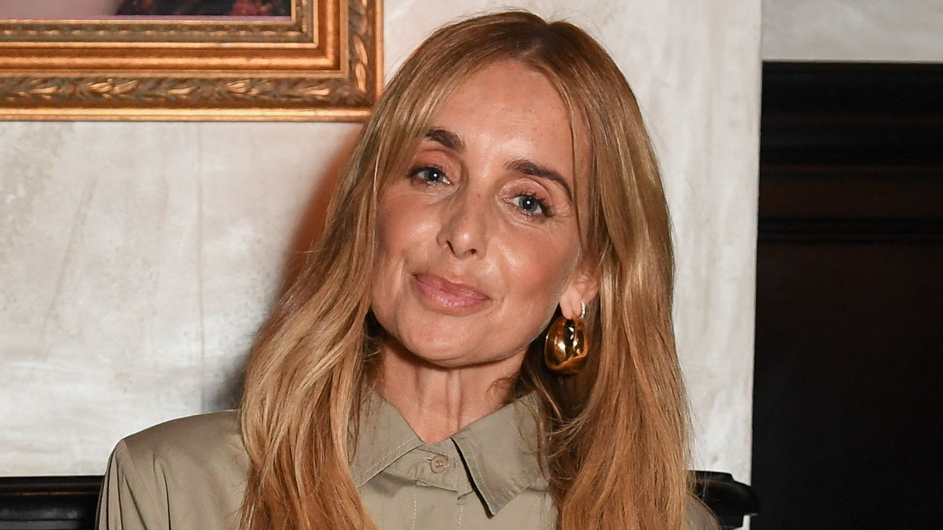 Louise Redknapp is a vision in striking fitted dress as she sends touching message