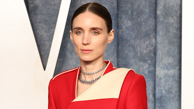 Rooney Mara in red and cream dress