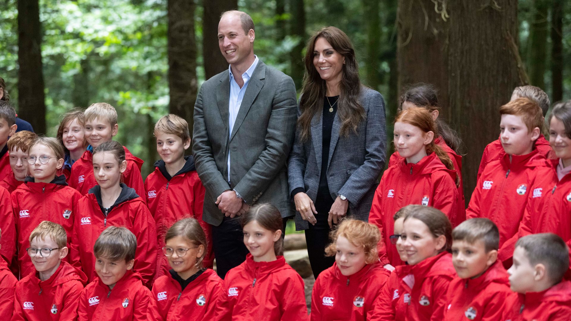 Prince William and Princess Kate with a group of schoolchildren