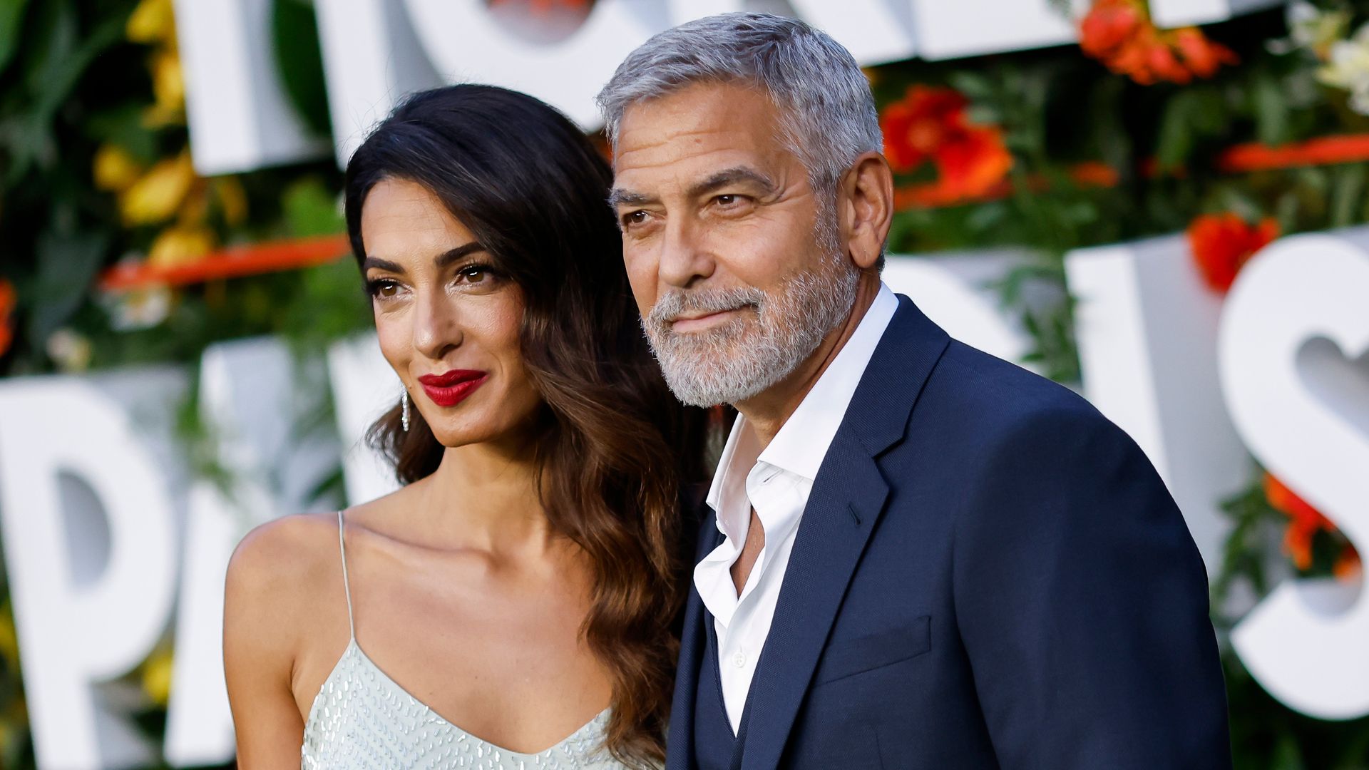 Amal Clooney and George Clooney attend the World Premiere of "Ticket to Paradise" at Odeon Luxe Leicester Square on September 07, 2022 in London