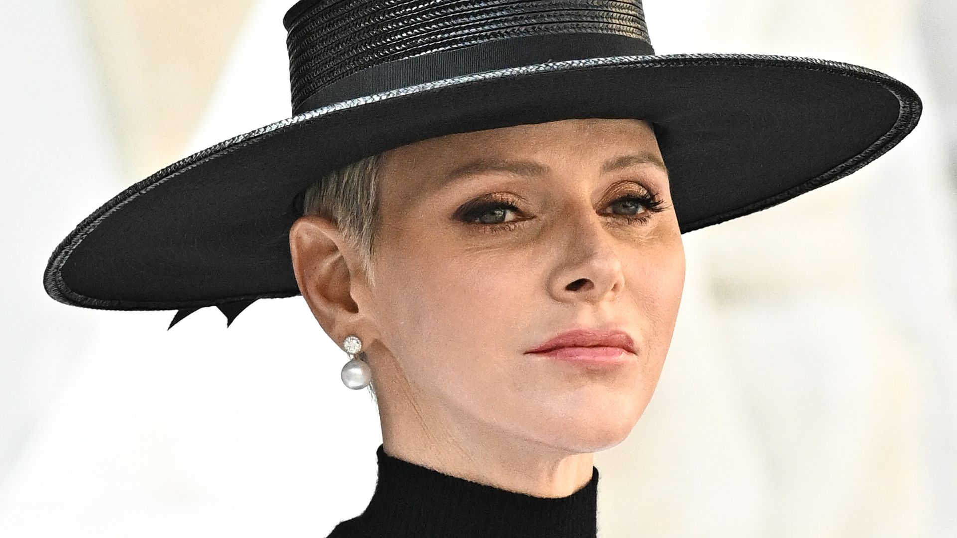 Princess Charlene debuts sweeping updo on sad occasion