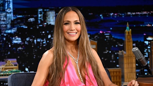 Jennifer Lopez, 54, displays endlessly long legs in plunging hot pink