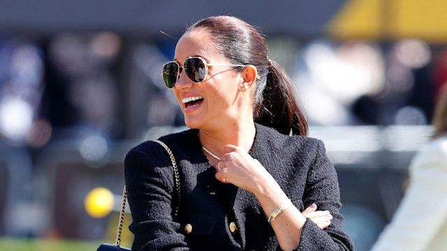 Meghan Markle in boucle jacket and jeans in The Hague