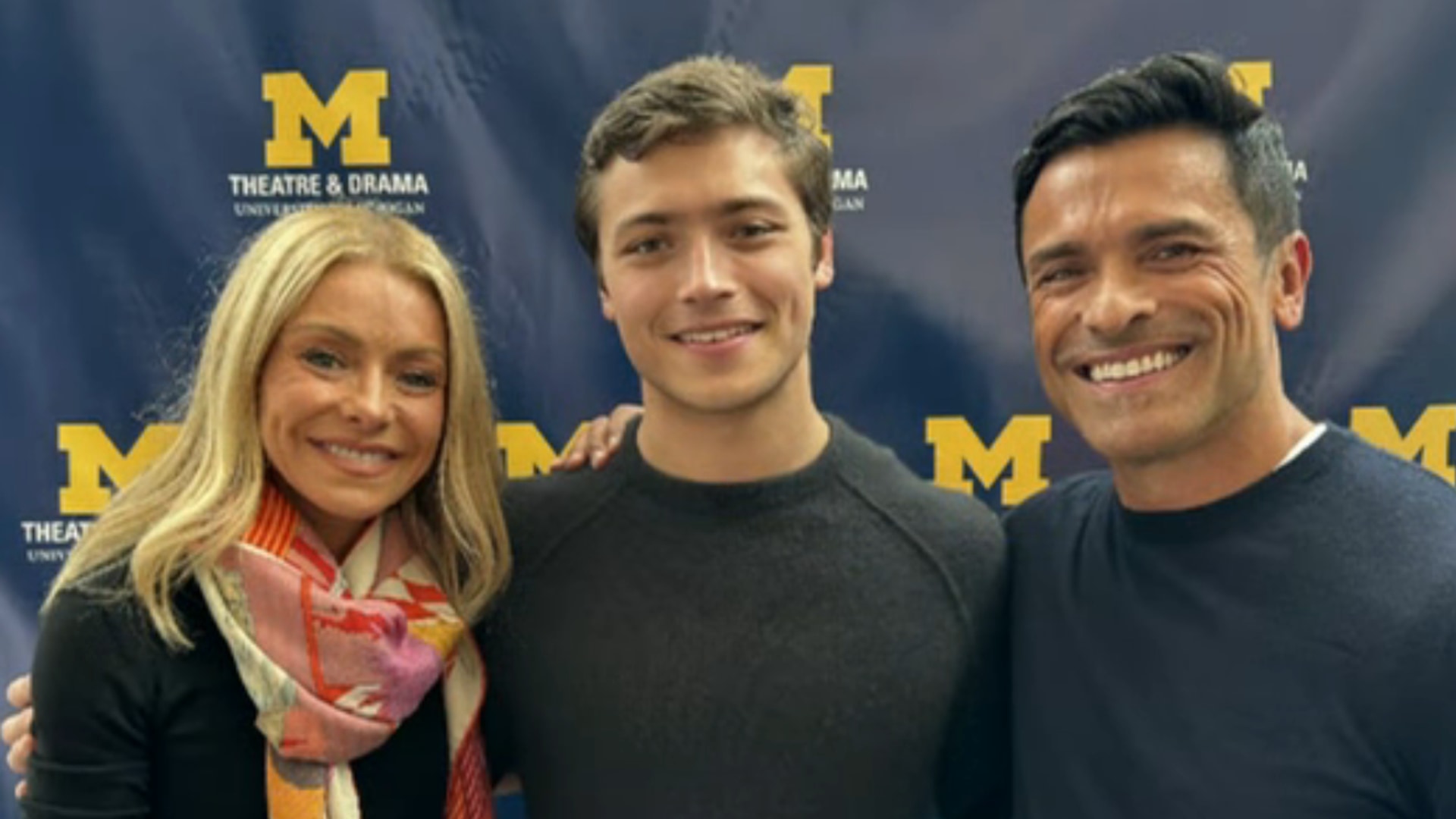 Kelly Ripa and Mark Consuelos embrace Joaquin Consuelos ahead of his graduation ceremony showcase at the University of Michigan, shared on LIVE with Kelly and Mark