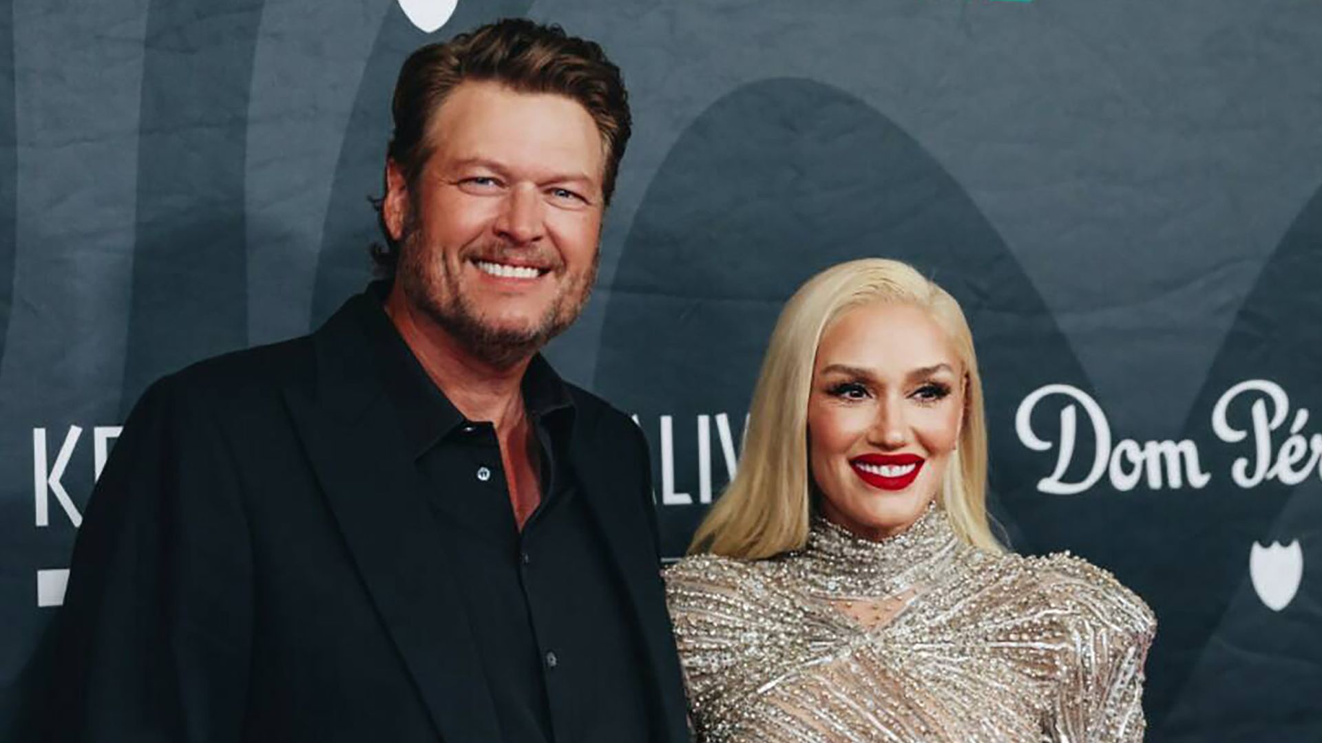 Gwen Stefani and Blake Shelton look so loved up as they cheer on son Apollo at LA football game