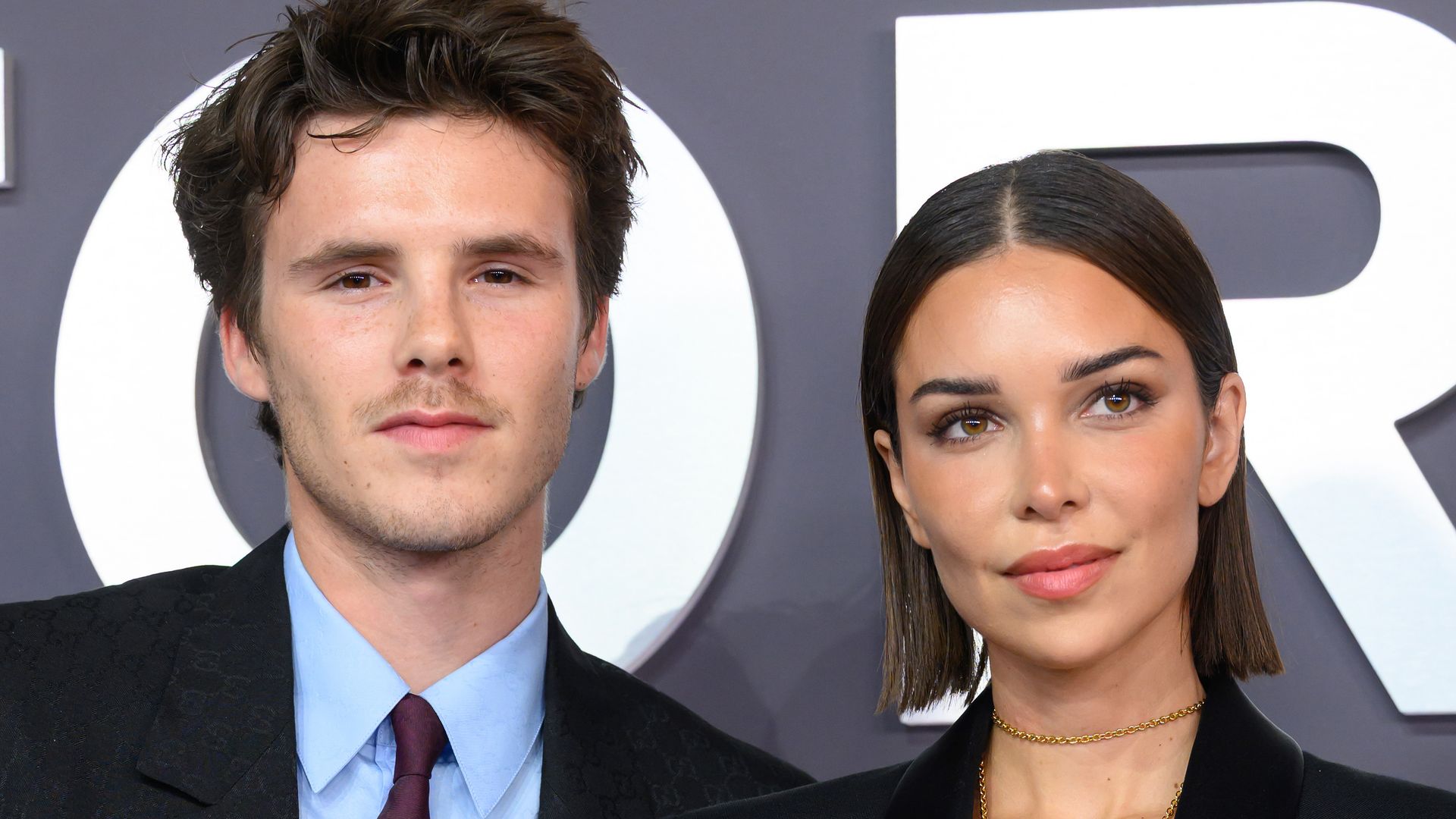 Cruz Beckham and Jackie Apostel attend the "Victoria Beckham" World Premiere at the Curzon Mayfair on October 08, 2025 in London, England