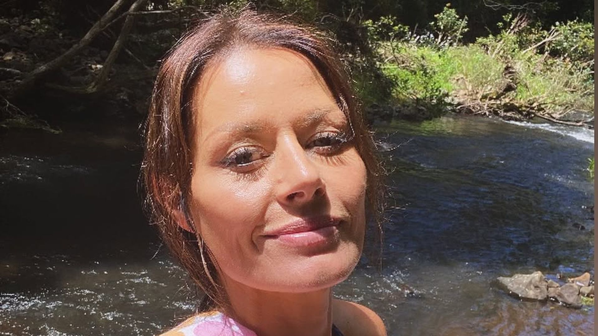 Madeleine West selfie by the river
