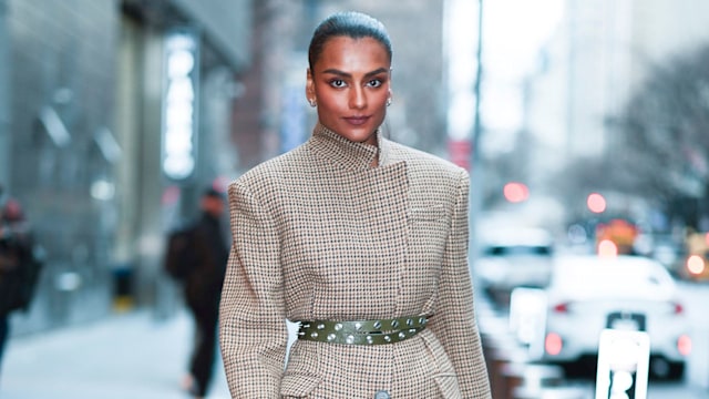 Simone Ashley seen in Midtown in checked blazer dress