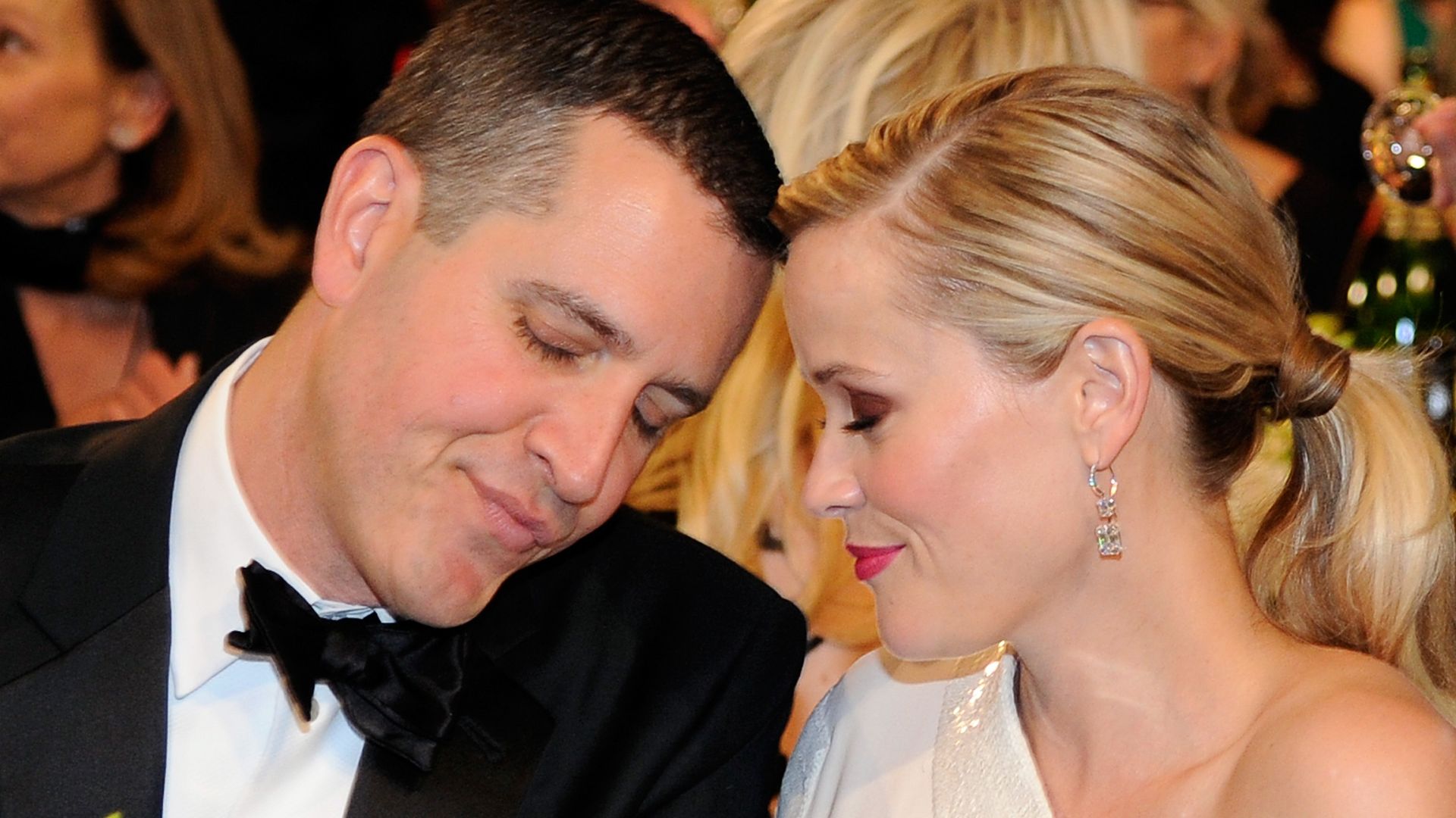 Reese Witherspoon and Jim Toth touching heads