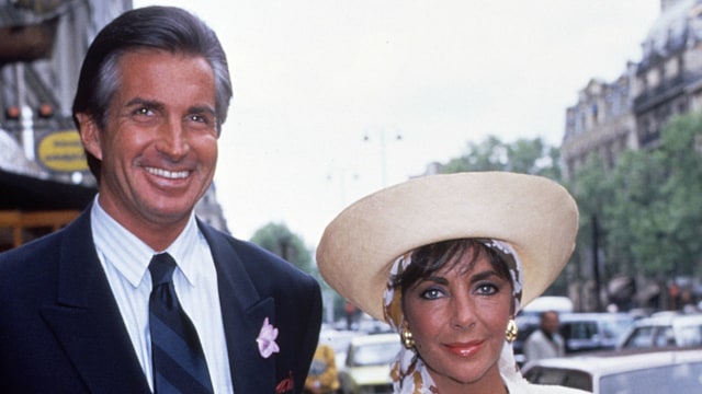 George Hamilton and Elizabeth Taylor in Paris in May 1987