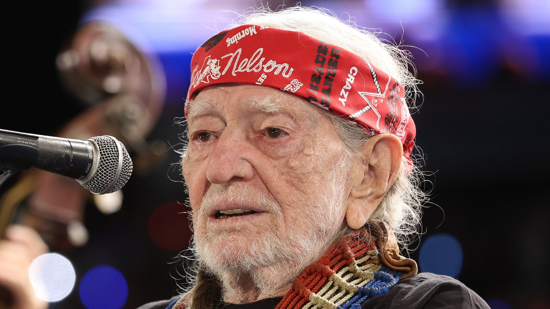 Musician Willie Nelson performs during a campaign rally with Democratic presidential nominee, U.S. Vice President Kamala Harris, at Shell Energy Stadium on October 25, 2024 in Houston, Texas. Vice President Kamala Harris is campaigning in Texas holding a rally supporting reproductive rights with recording artists Beyonce and Willie Nelson
