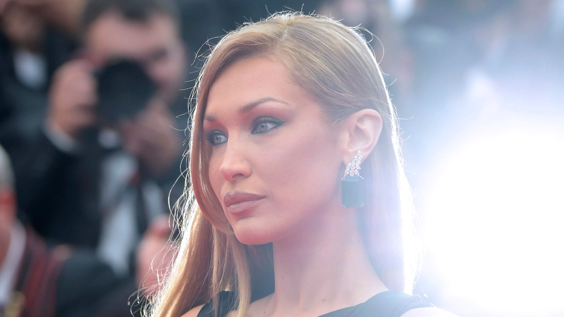 Bella Hadid wows in iconic glitter ball dress – but wait until you see who wore it first