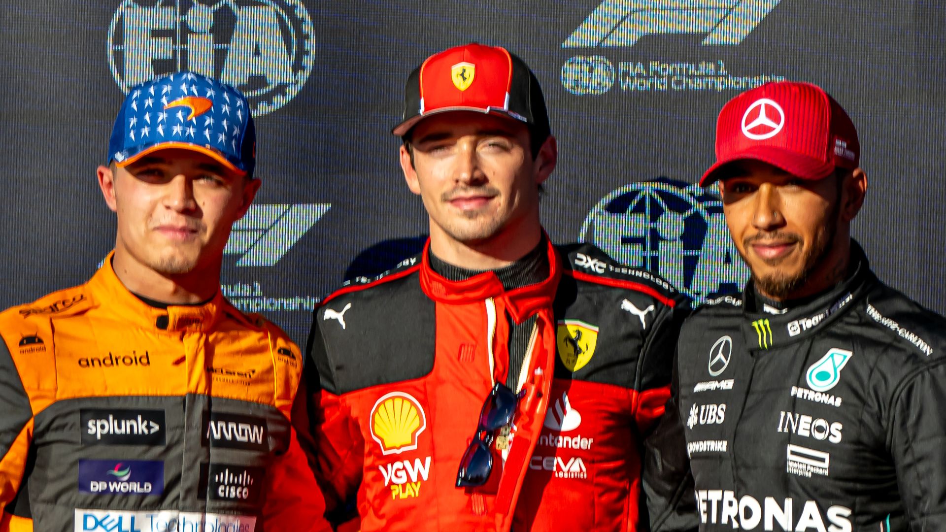 Group shot of Lando Norris, Charles Leclerc and Lewis Hamilton