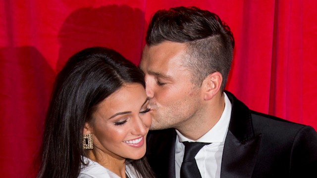  Michelle Keegan and Mark Wright share a kiss at the British Soap Awards 2014