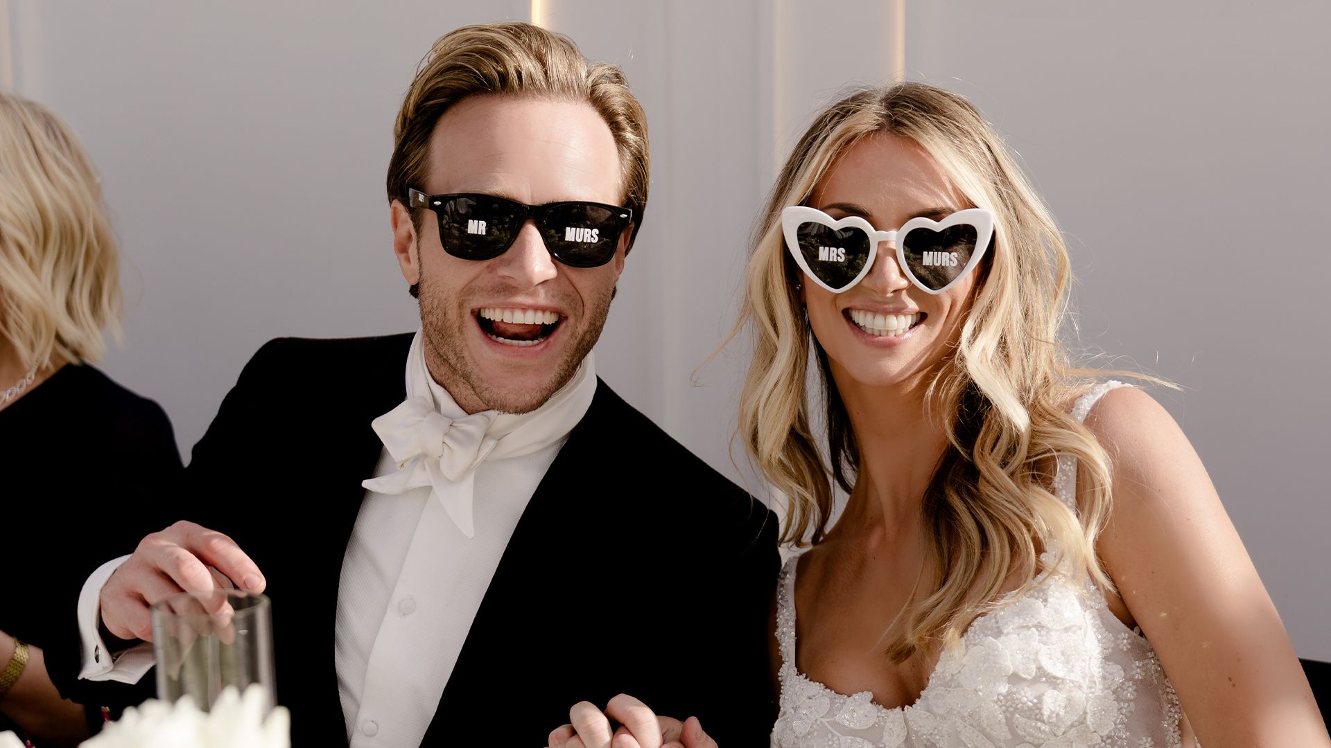 Olly Murs and his bride Amelia wear quirky sunglasses