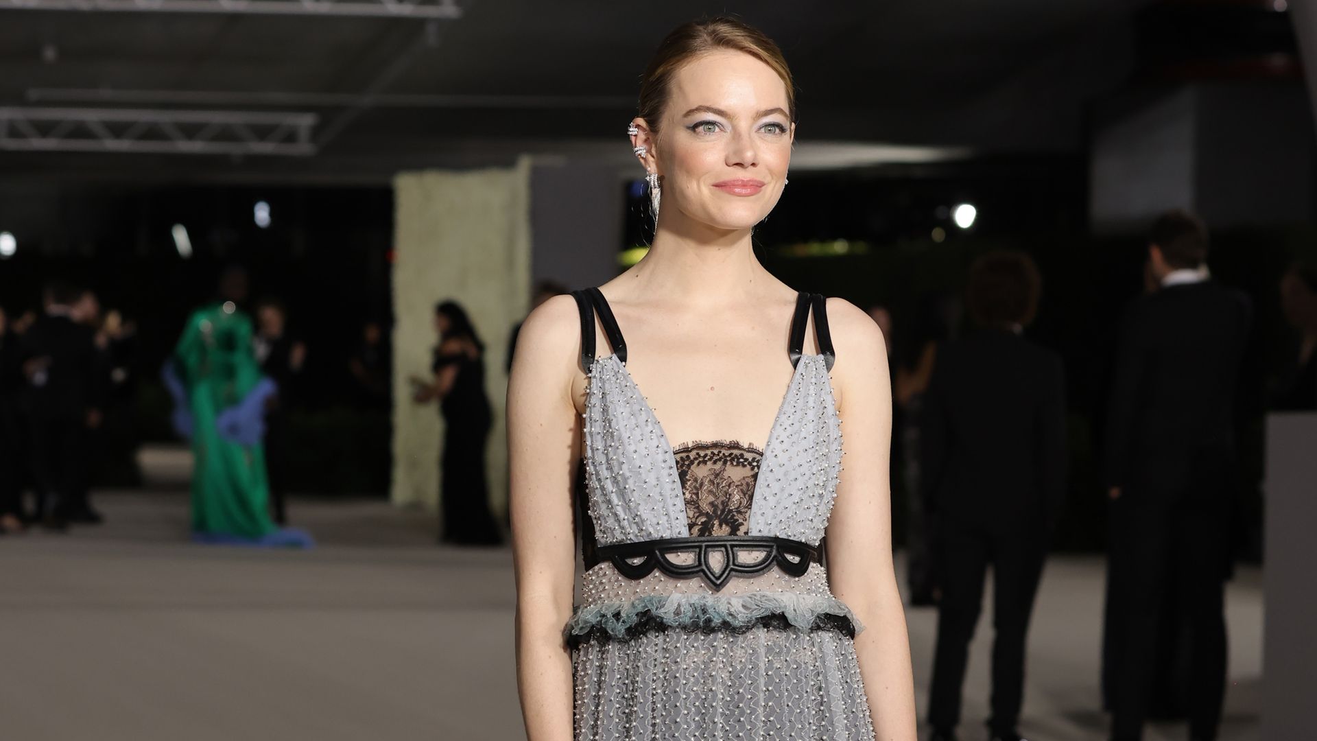 Emma Stone perfects the high-waisted jeans look for rare appearance