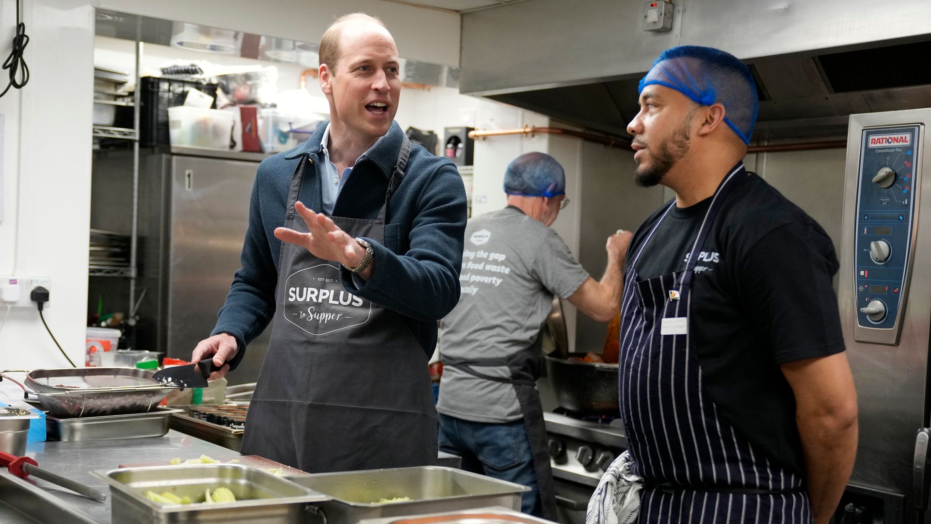 Prince William helps make bolognese sauce with head chef Mario Confait