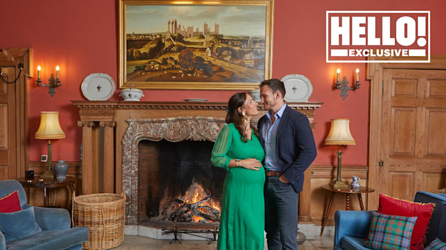 Matthew Kinloch and Johanna Squiban posing in front of fireplace at Gilmerton House 