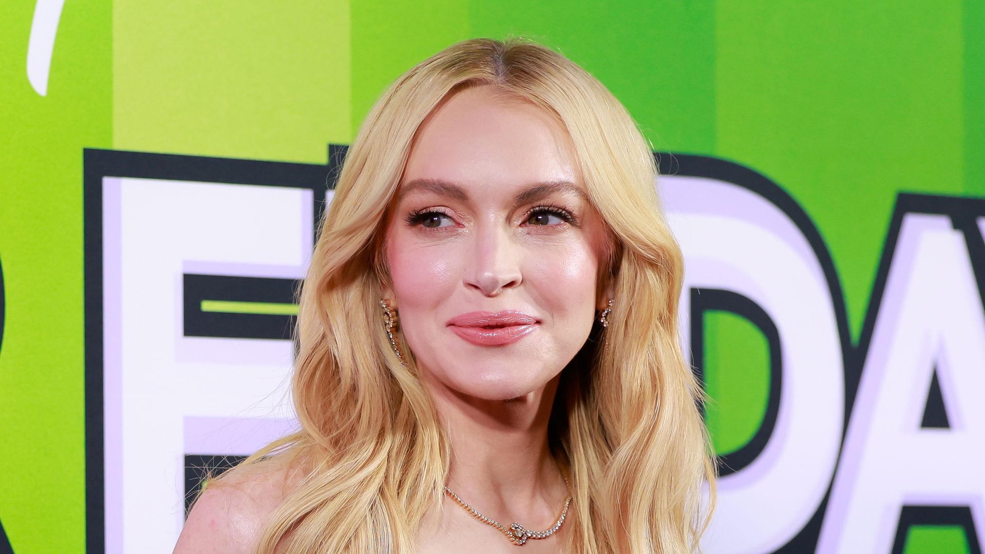 lindsay lohan black gown blonde hair