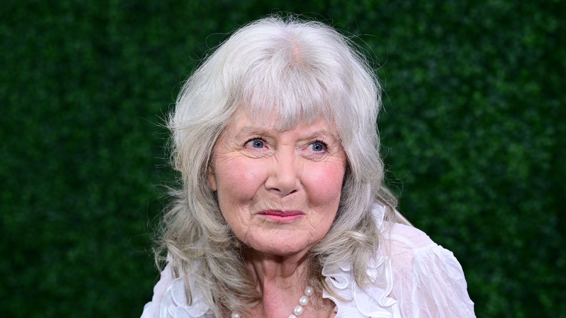 close-up woman with white hair