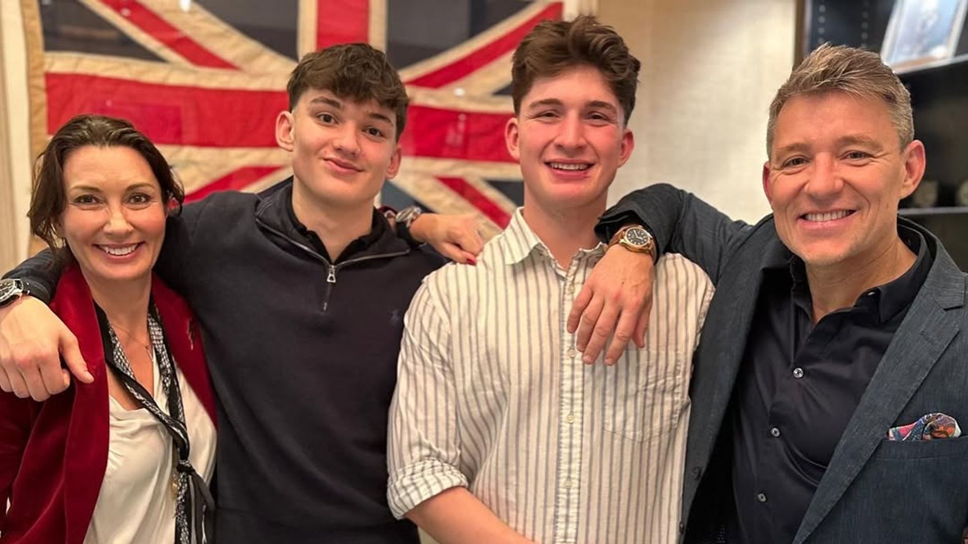 Photo of Ben Shephard standing with his arm around son, Sam with his other son Jack and Annie on the other side