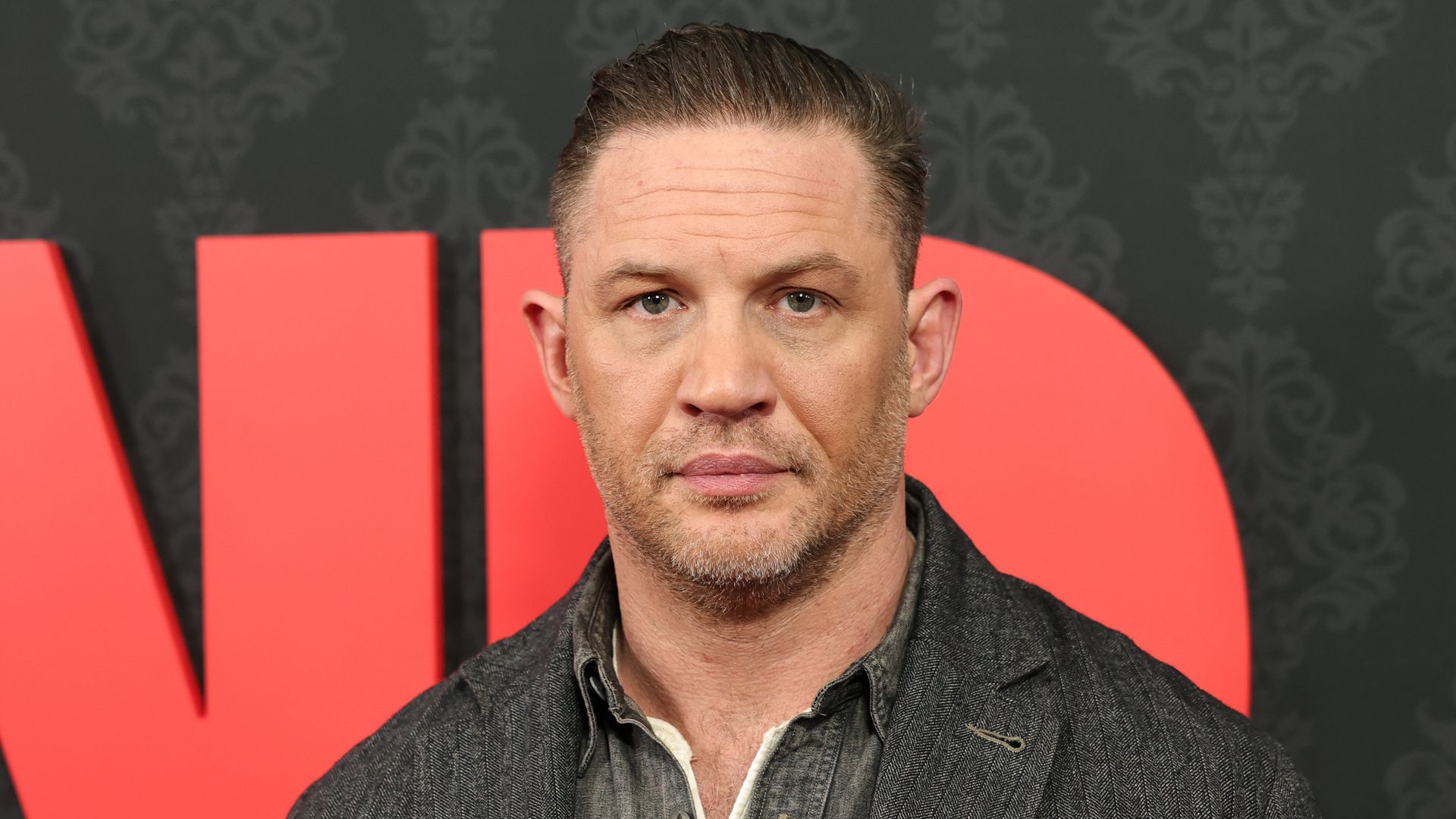 close-up of actor on red carpet 