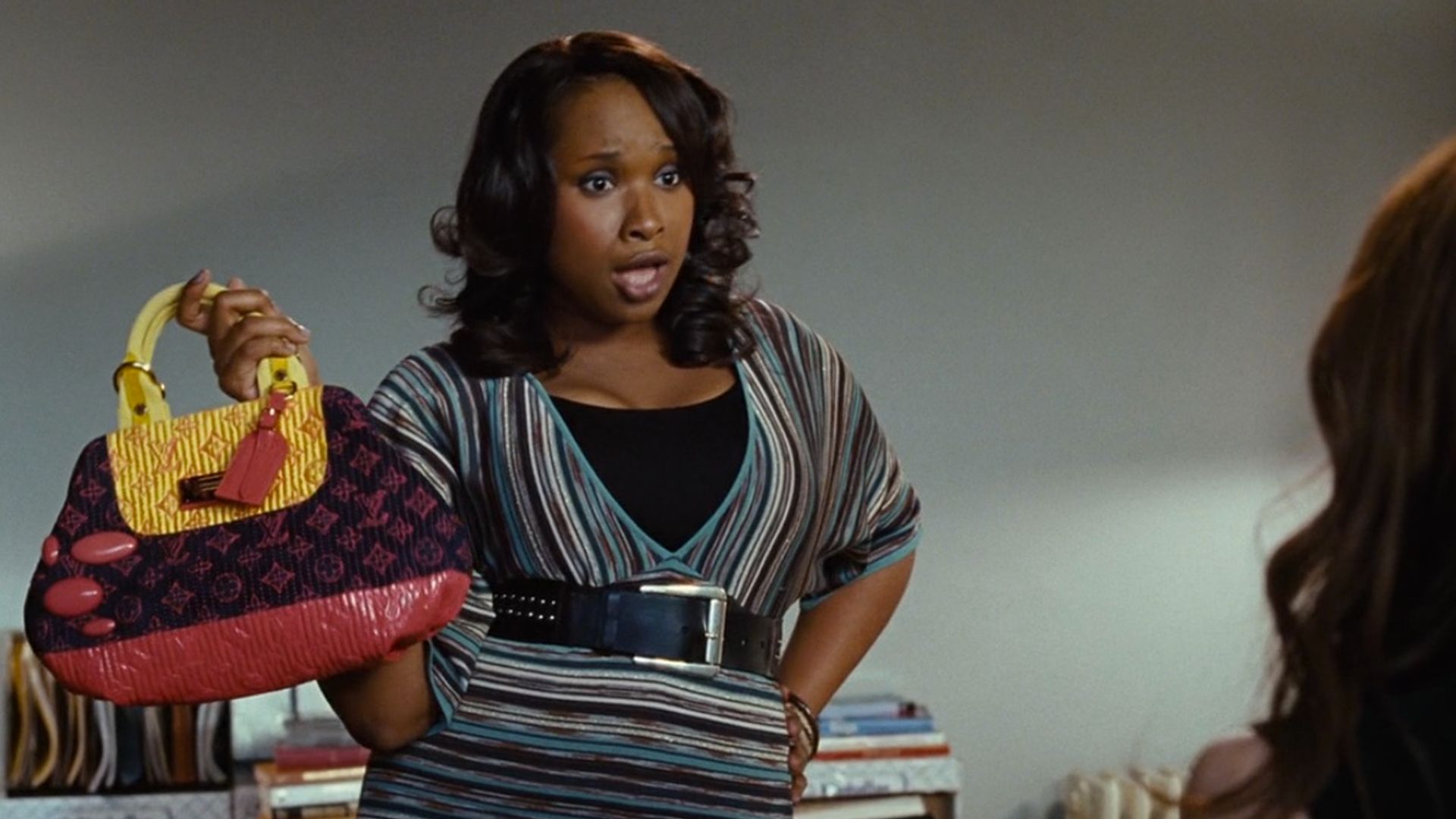jennifer hudson holding up louis vuitton bag in sex and the city
